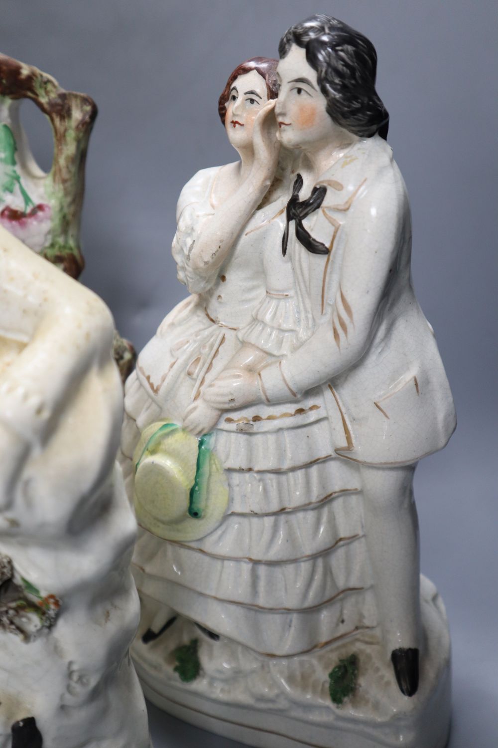 A collection of Staffordshire figures, including a flatback entitled Fortune Teller, height 32cm,